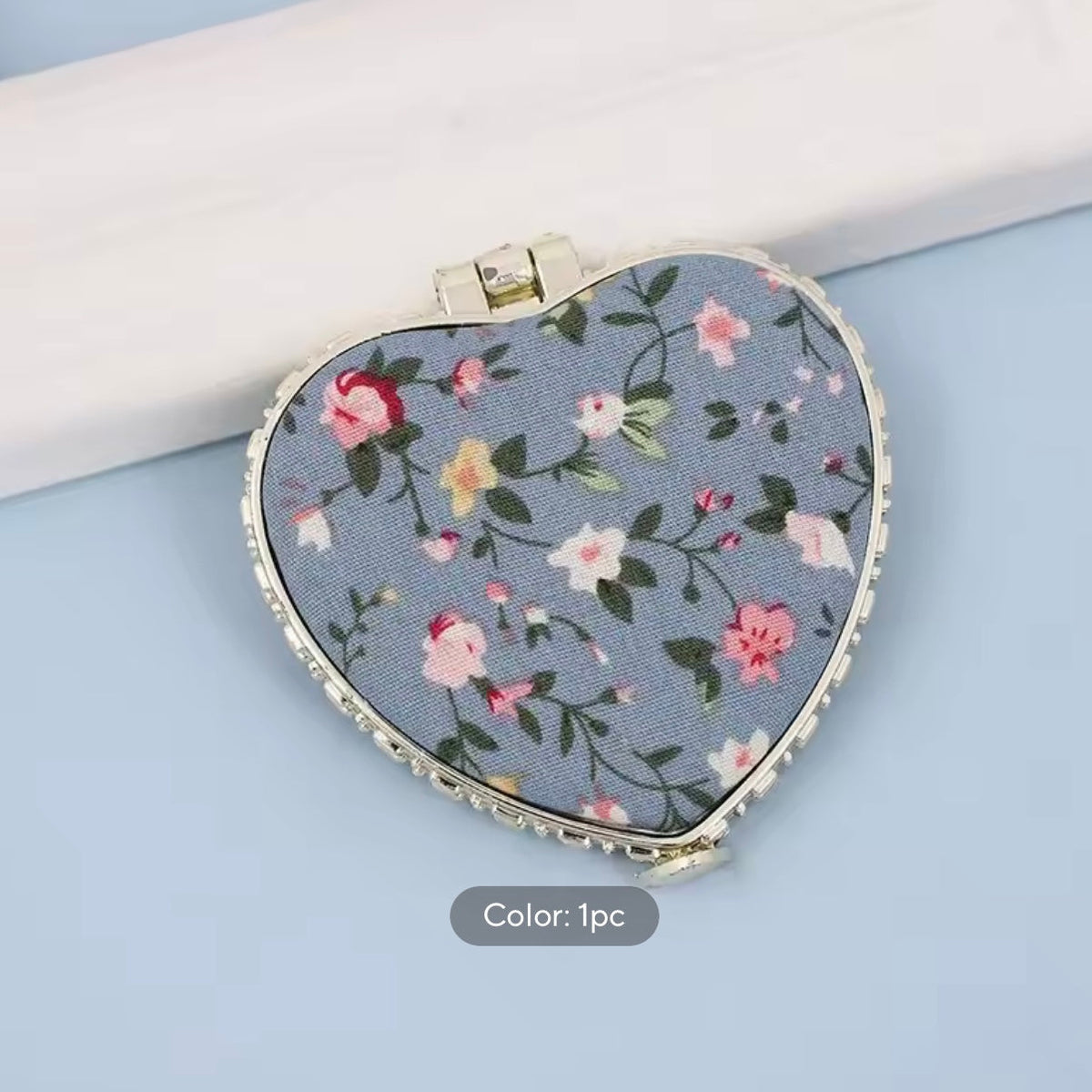 heart hand mirror
