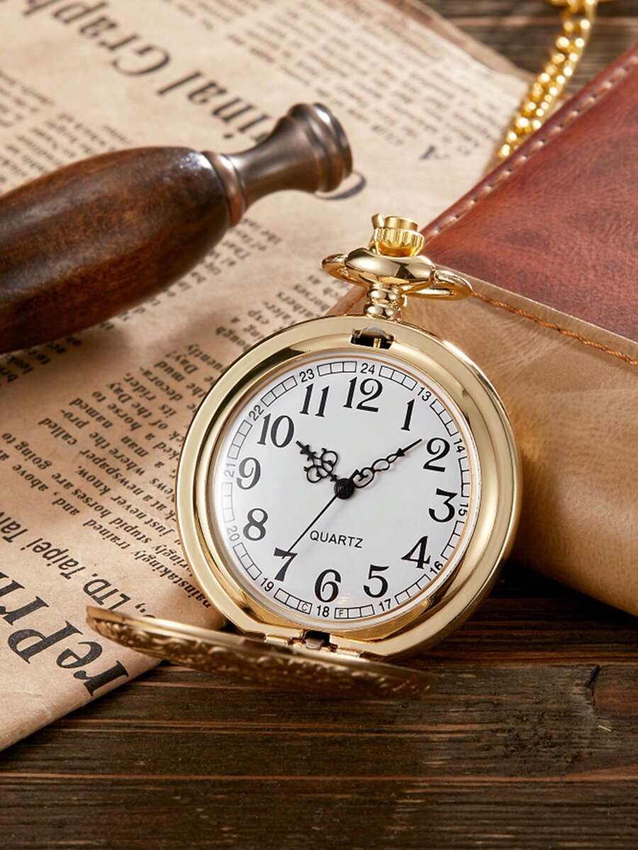round gold pocket watch