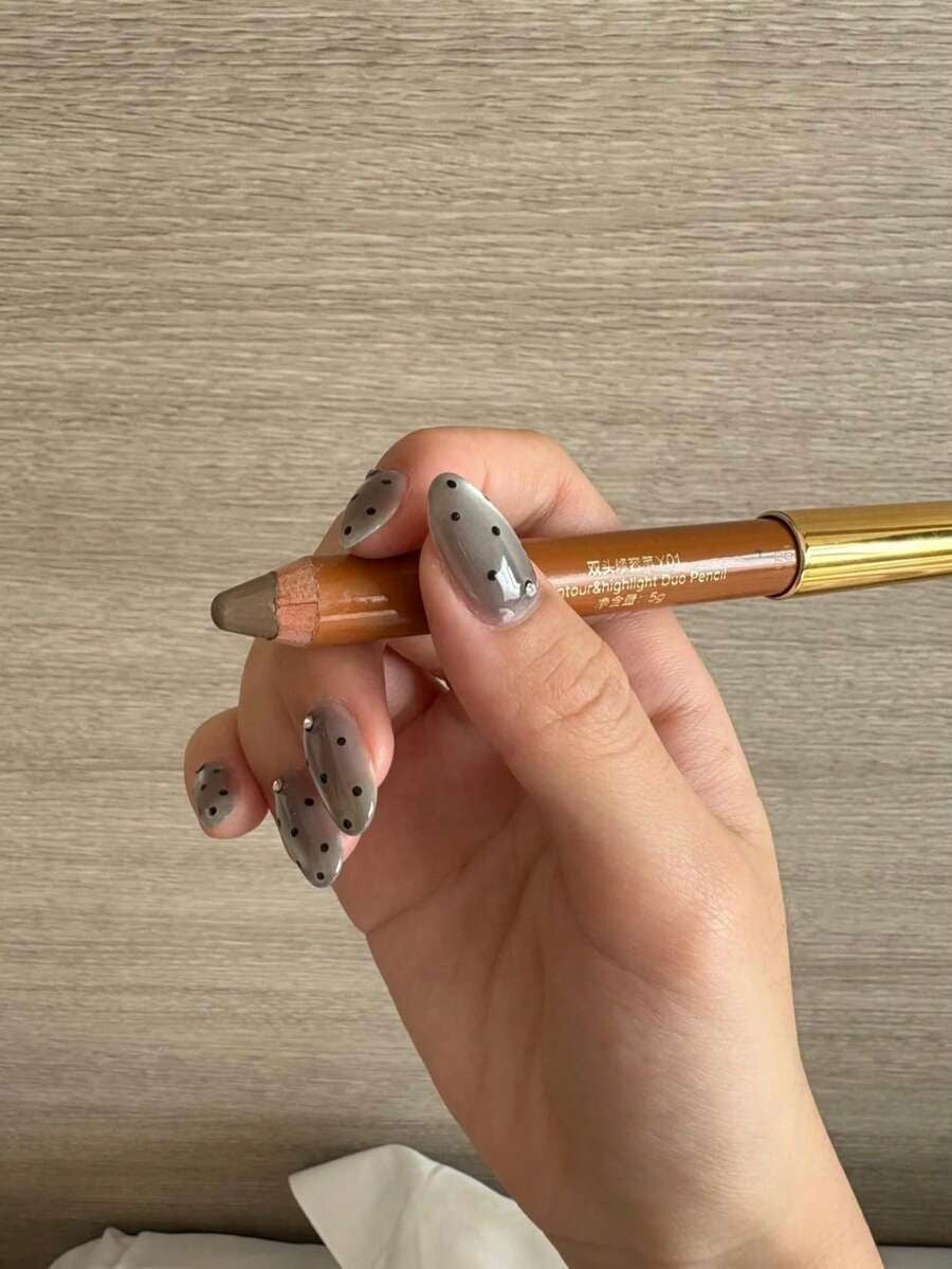 grey polka dot cat eye nails