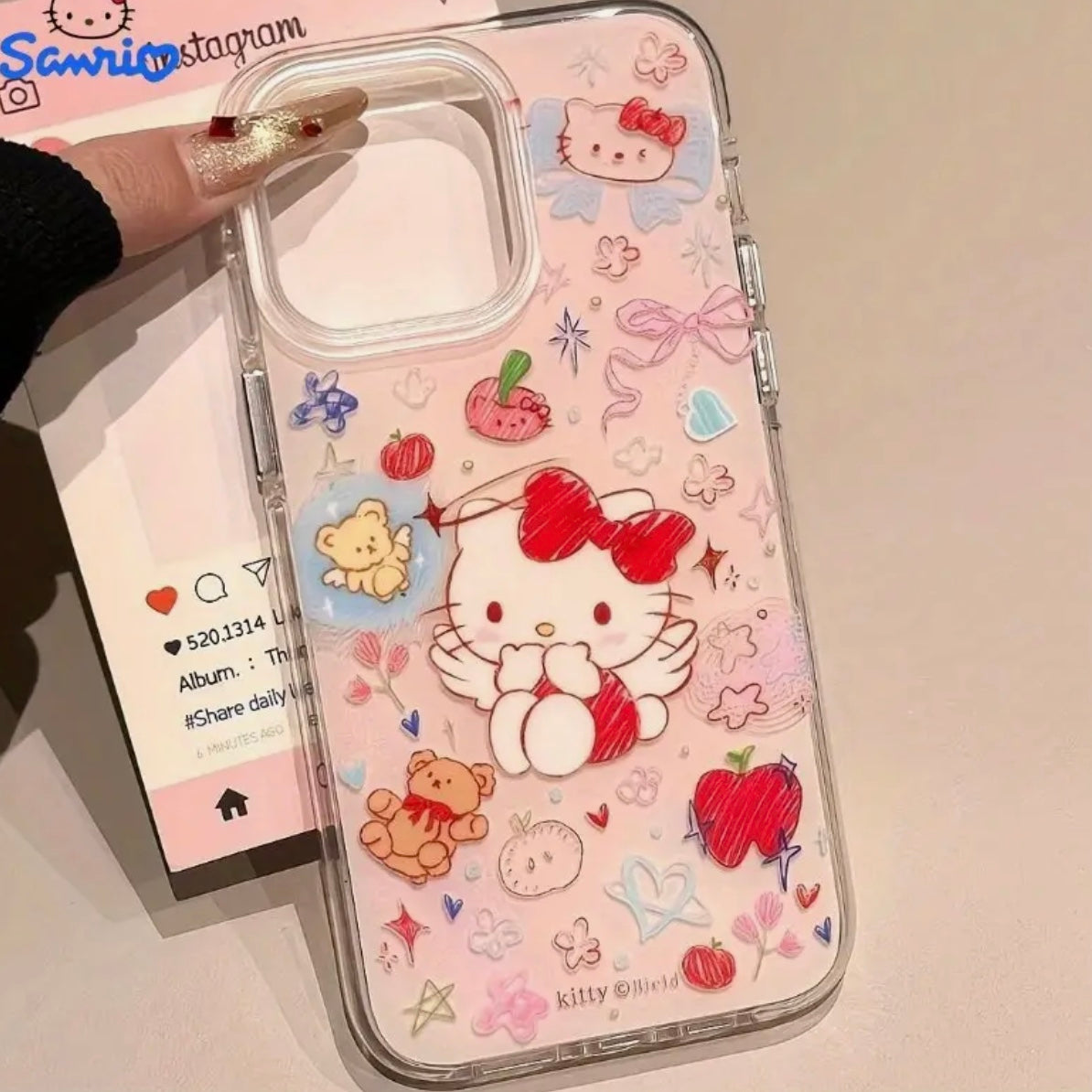 hello kittty phone case (includes the charm)