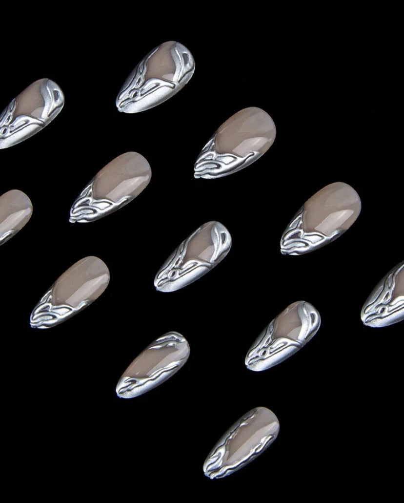 silver chrome medium almond nails