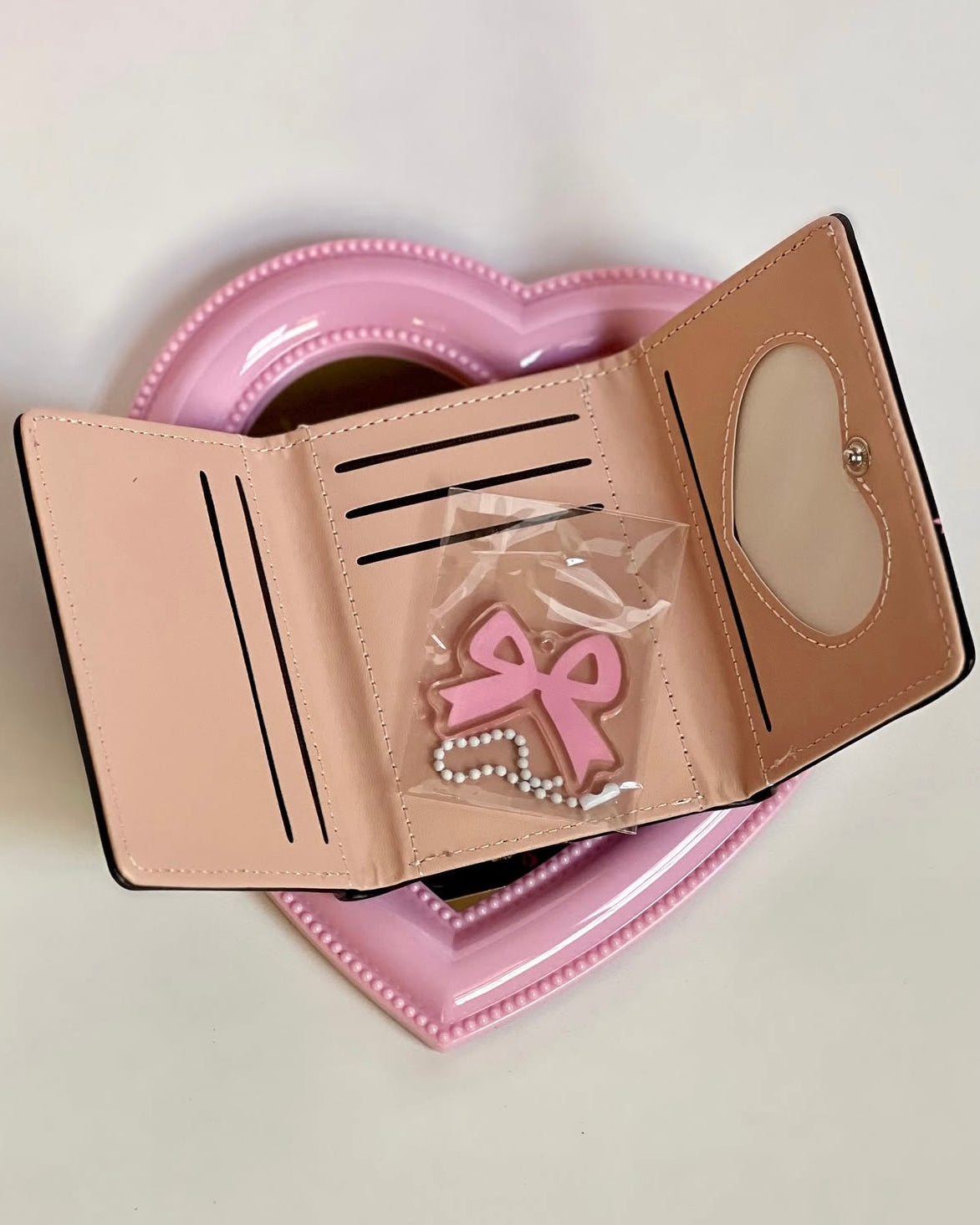 black bow wallet
