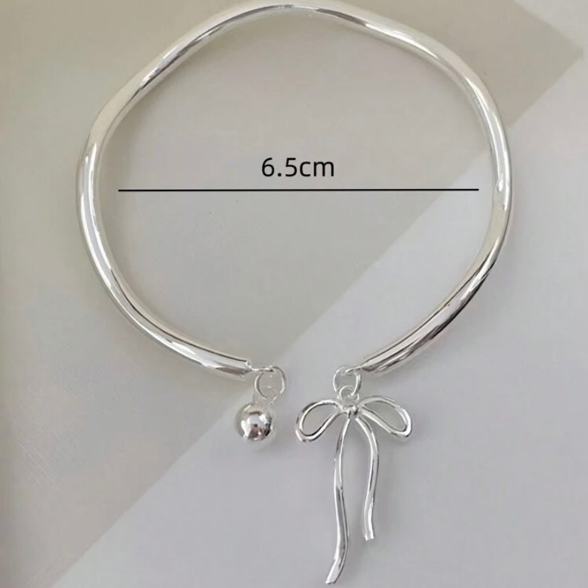silver bow bracelet