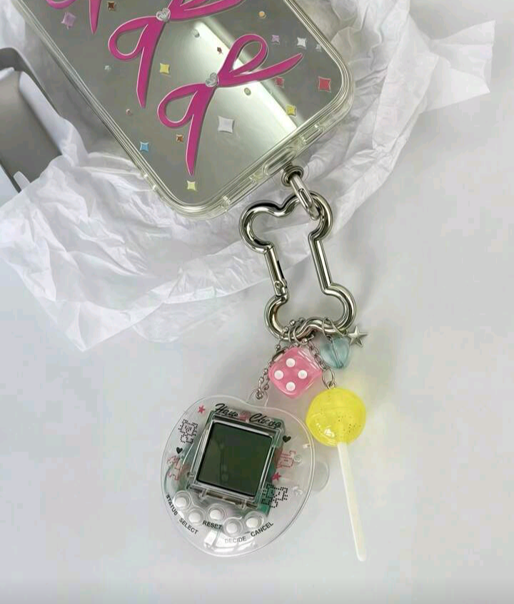 white tamagotchi keychain