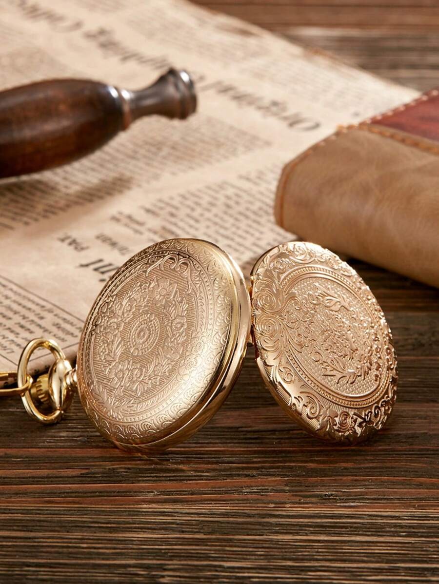 round gold pocket watch
