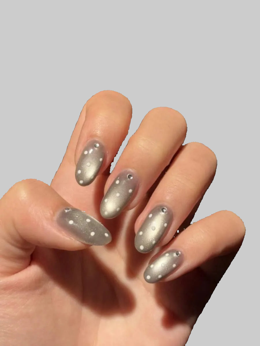 grey polka dot cat eye nails