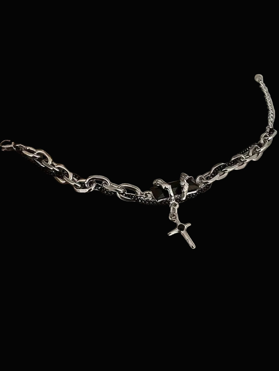 the shadow-melt cross bracelet