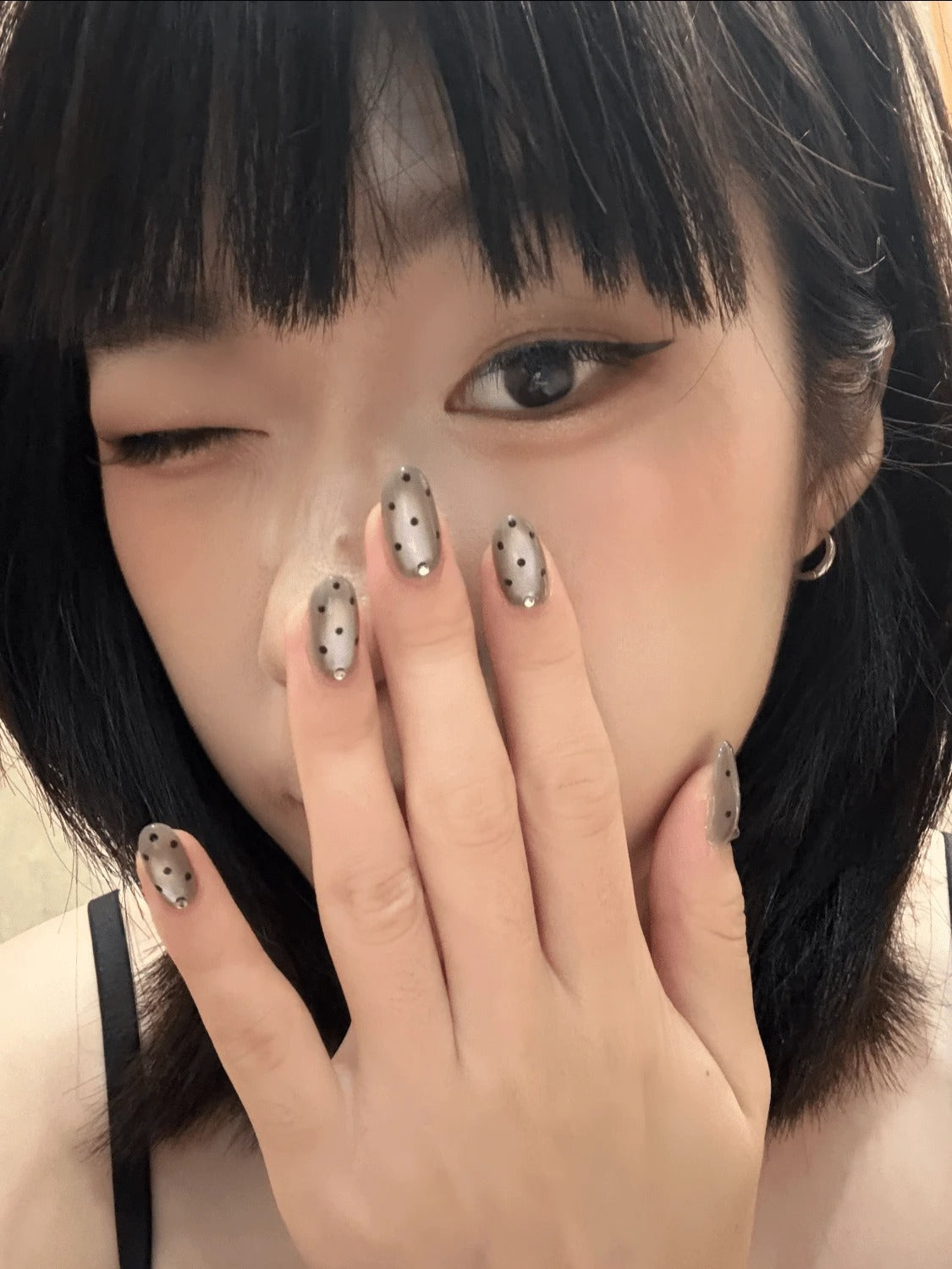 grey polka dot cat eye nails