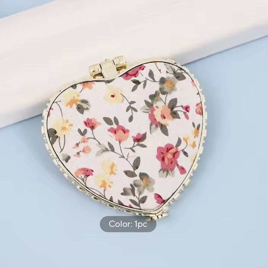 heart hand mirror