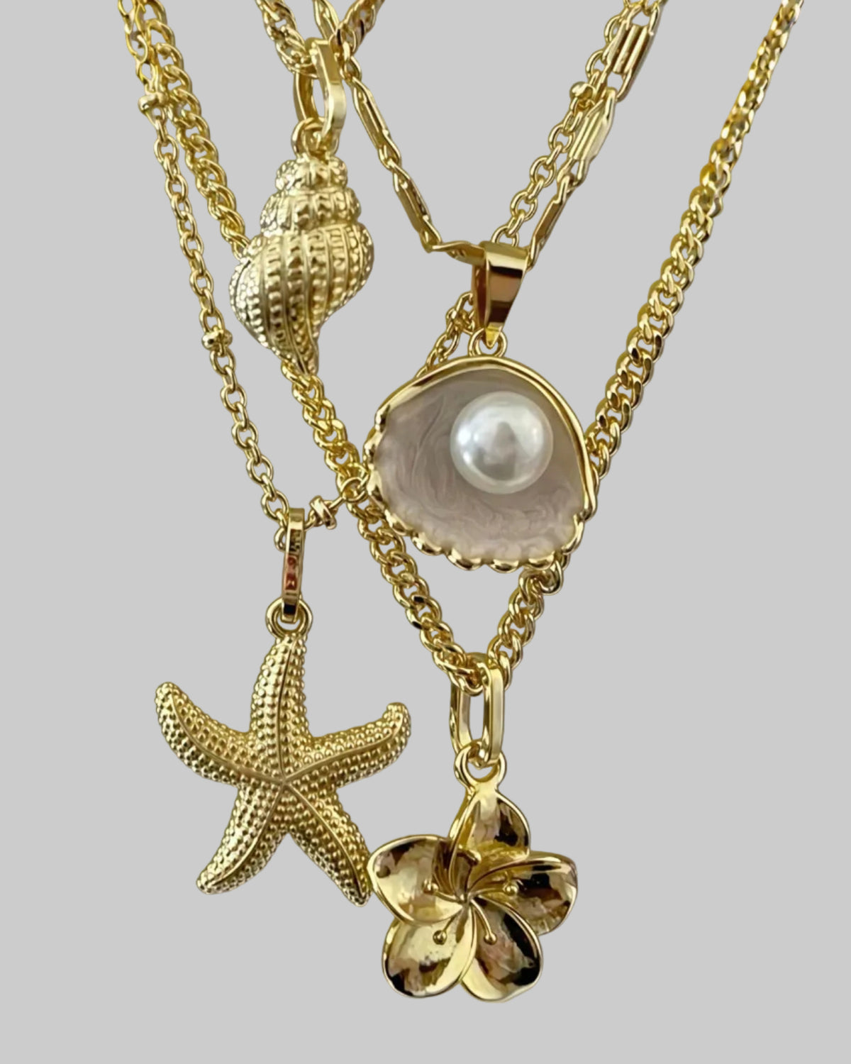 gold sea themed layered necklace set