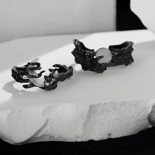 black sun and moon rings