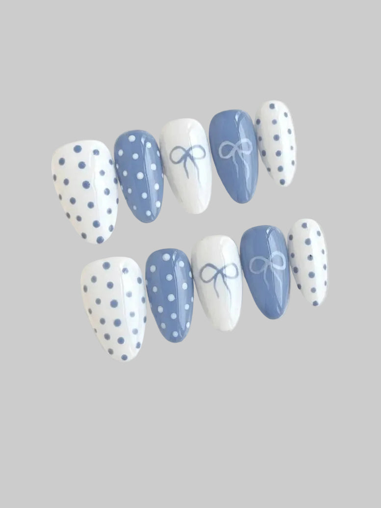 baby blue polka dot nails