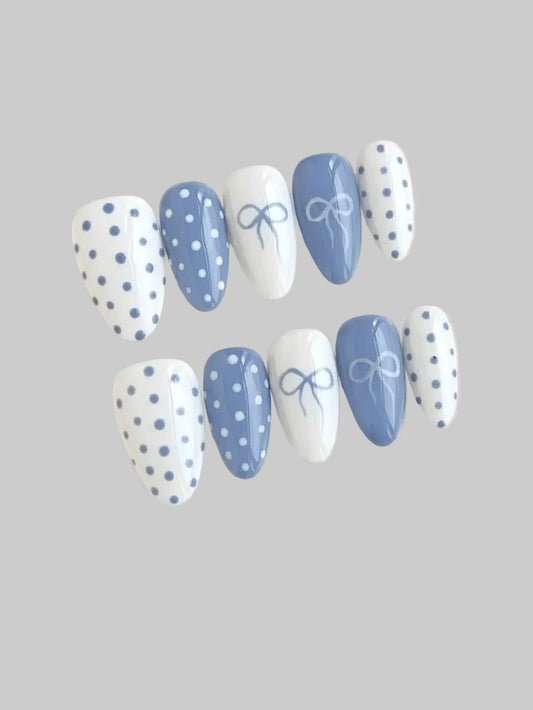 baby blue polka dot nails