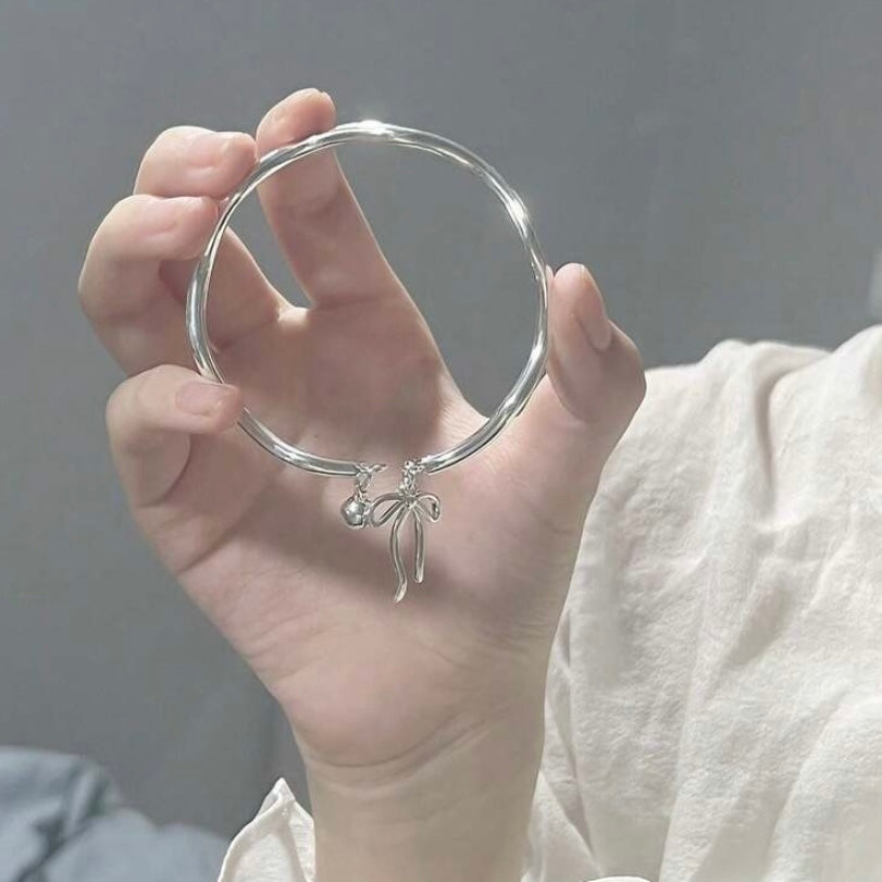 silver bow bracelet