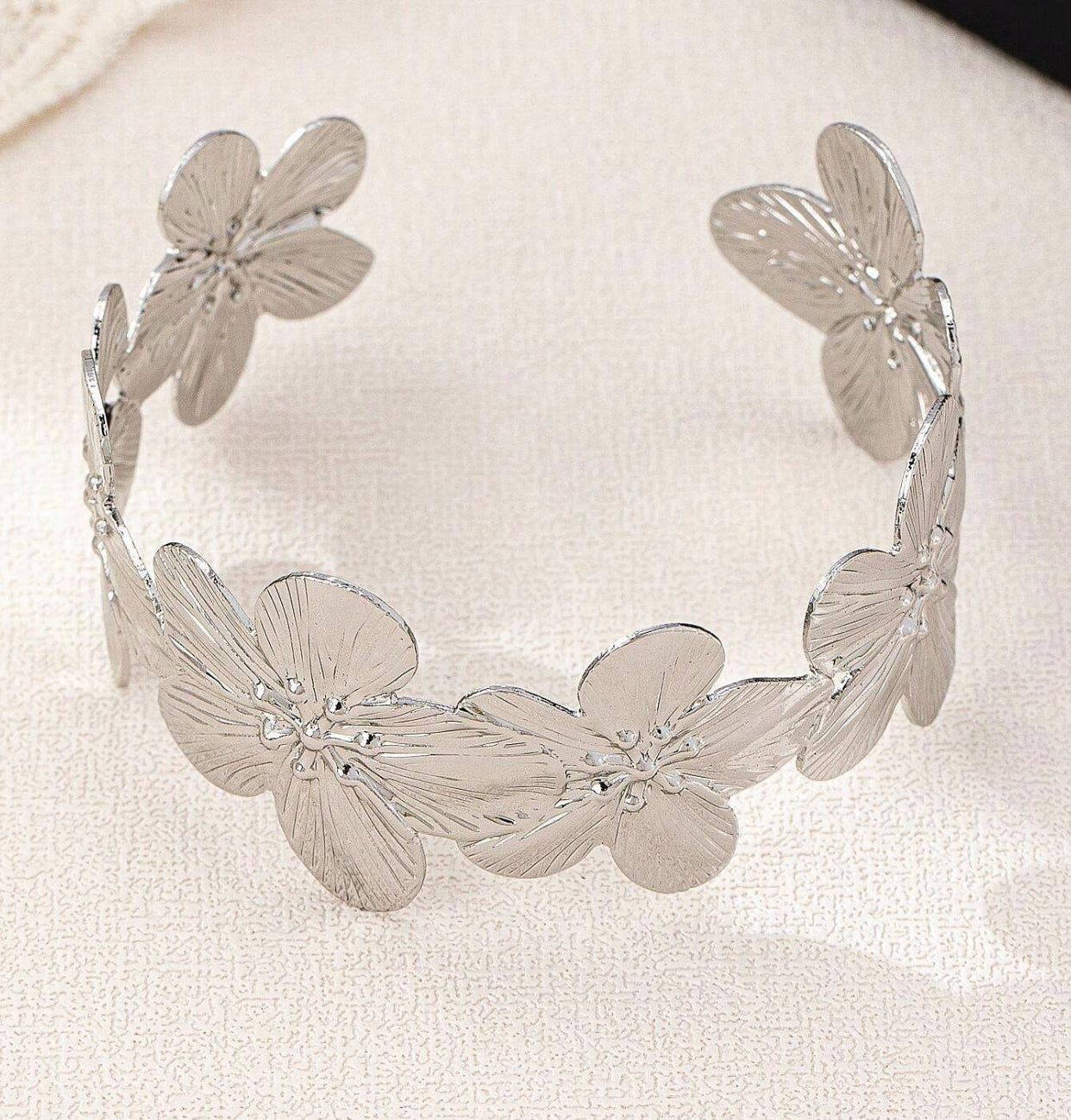 silver flower arm cuff