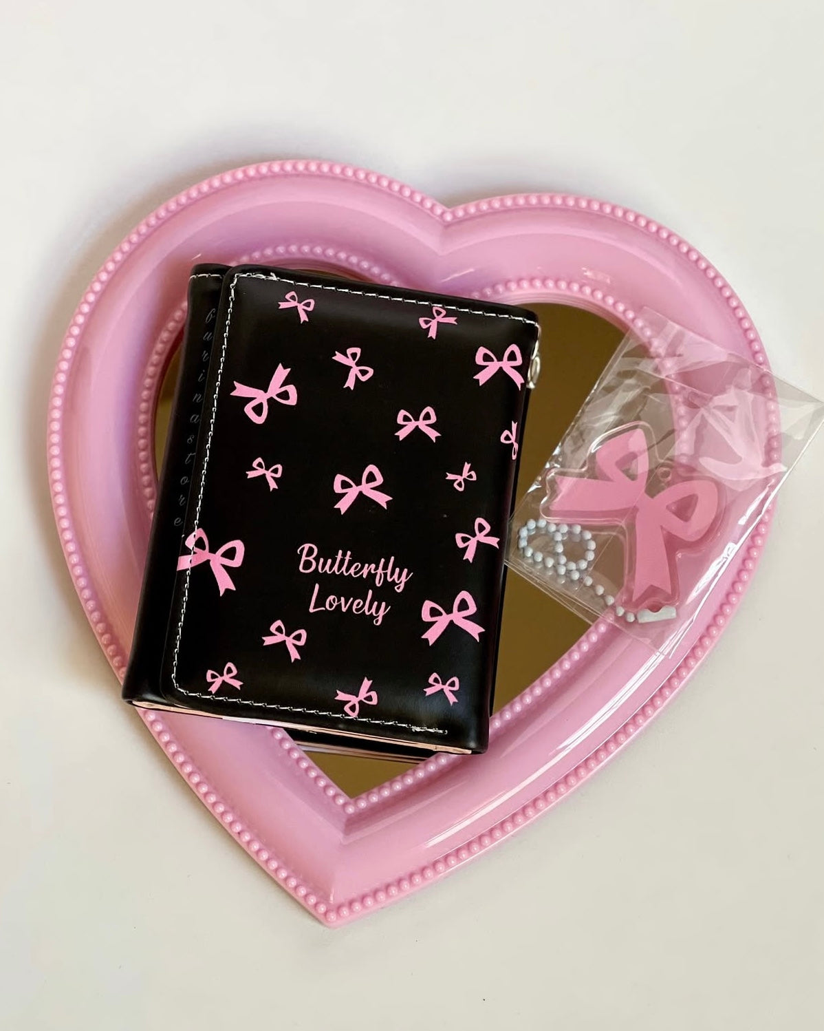 black bow wallet