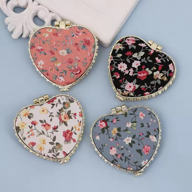 heart hand mirror