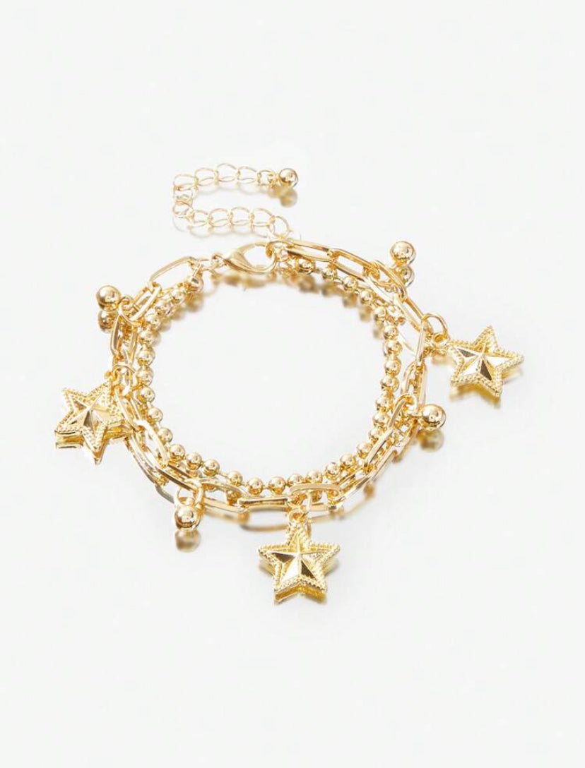 multi layered gold star bracelet