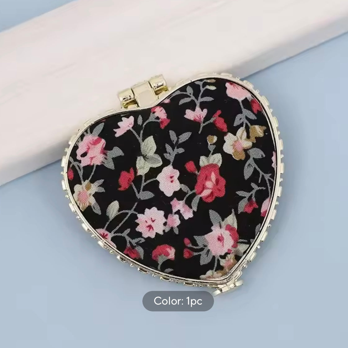 heart hand mirror