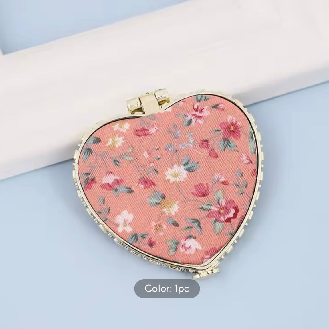 heart hand mirror
