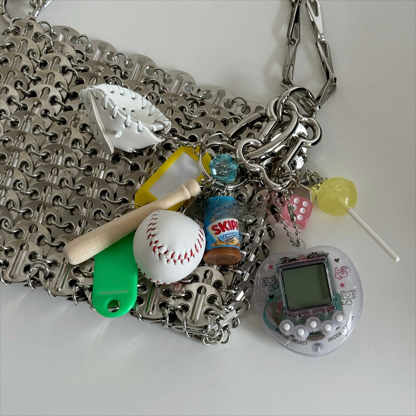 tamagotchi pink and white keychains