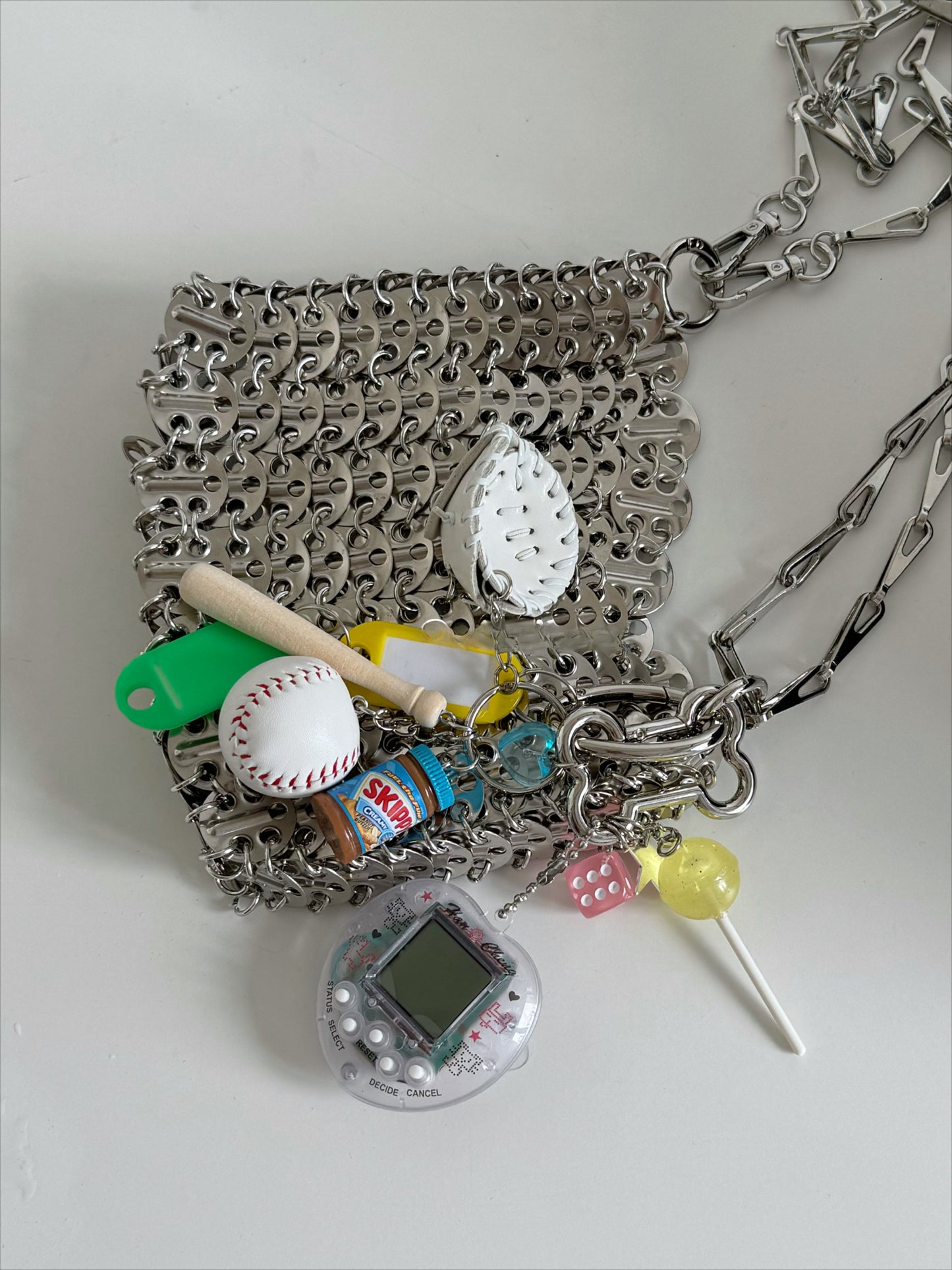 tamagotchi pink and white keychains