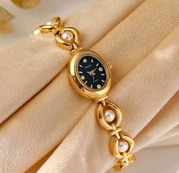 golden pearl watch