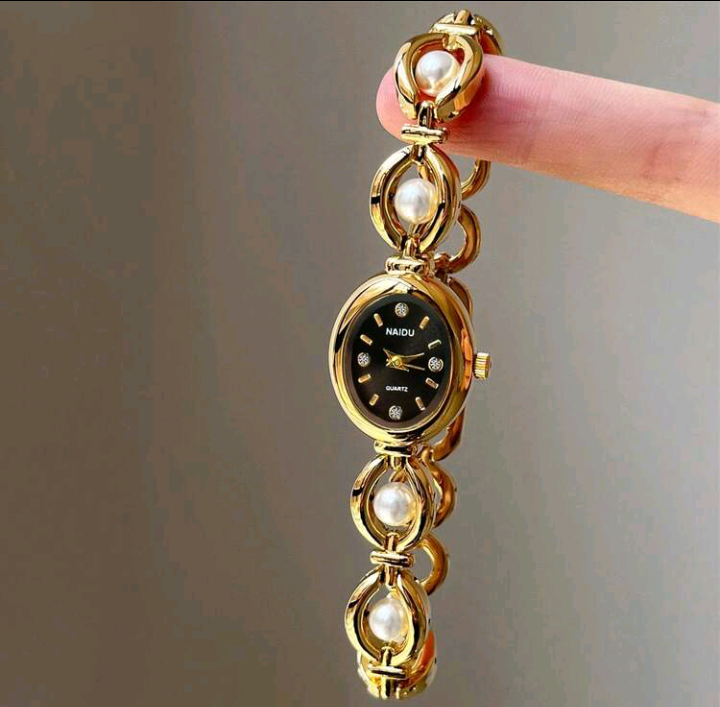 golden pearl watch