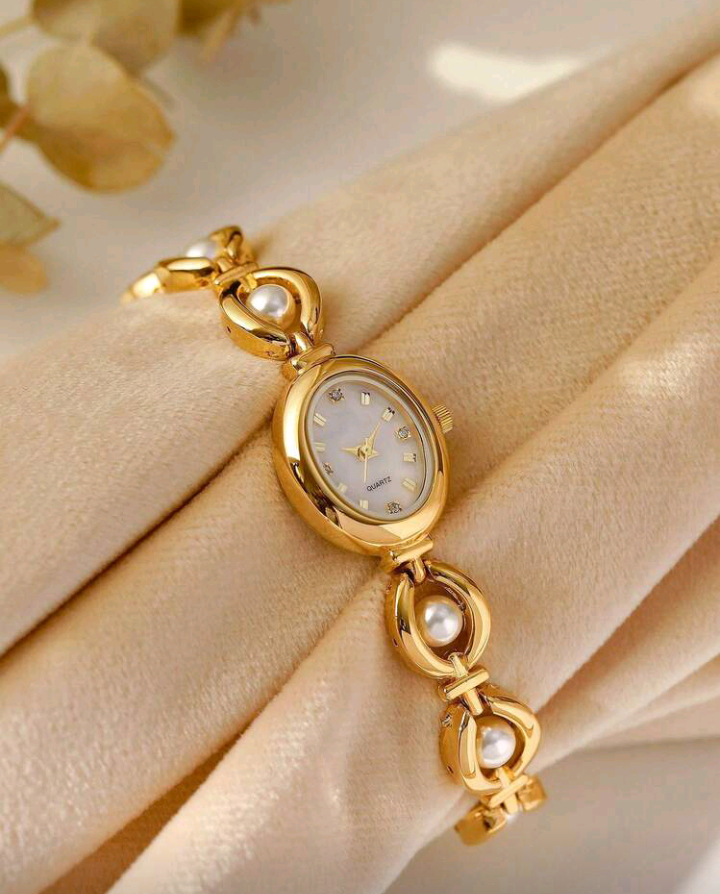 golden pearl watch