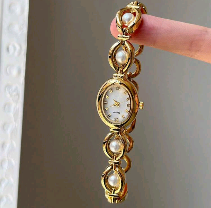 golden pearl watch
